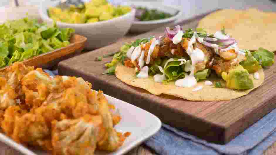 Buffalo Cauliflower Tacos Recipe: Assemble the tacos.