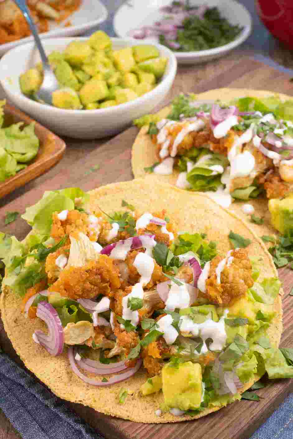 Buffalo Cauliflower Tacos Recipe: Serve the tacos immediately and enjoy!
