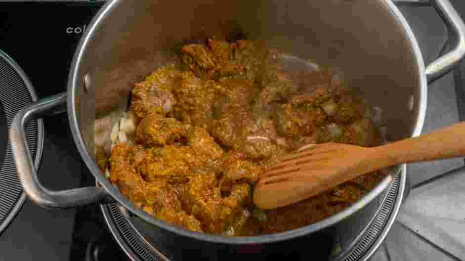 Lamb Vindaloo Recipe: Increase the heat to medium high and add the lamb with its marinade and sauté for about 5 minutes, stirring occasionally.