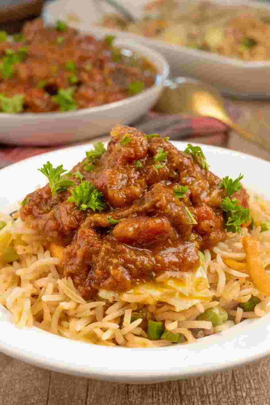 Lamb Vindaloo Recipe: Remove from oven and serve the lamb vindaloo on top of rice or with naan.