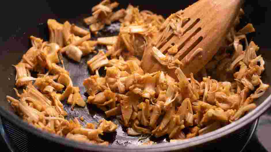 Vegan Burrito Bowl Recipe: In a skillet over medium-high heat, cook the jackfruit for 5 minutes.