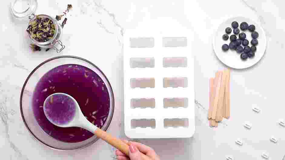 Lemon Blueberry Boba Popsicles Recipe: Spoon the mixture into the popsicle mold.