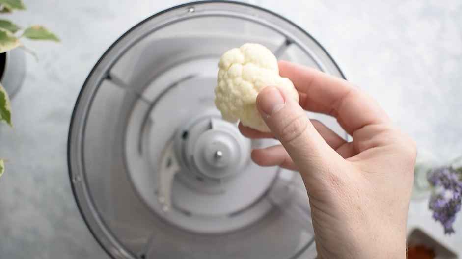 Spanish Cauliflower Rice Recipe: Remove the green leaves from the cauliflower and roughly chop into pieces.