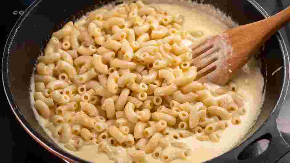 Creamy Macaroni and Cheese Recipe: Add the macaroni to the cheese sauce.