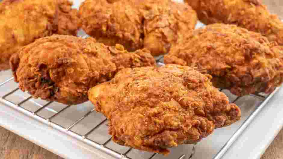 Crispy Fried Chicken Recipe: Let chicken drain on a wire rack lined with paper towels.