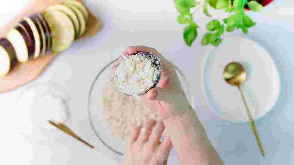 Vegan Eggplant Parmesan Recipe: Add a thin layer of vegan mayonnaise on both sides of the eggplant.