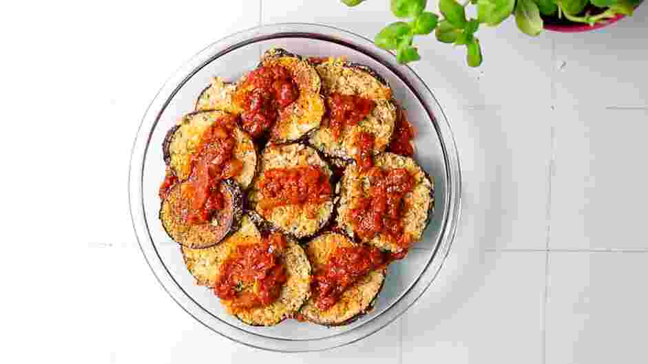 Vegan Eggplant Parmesan Recipe: Ladle the remaining marinara sauce on top.