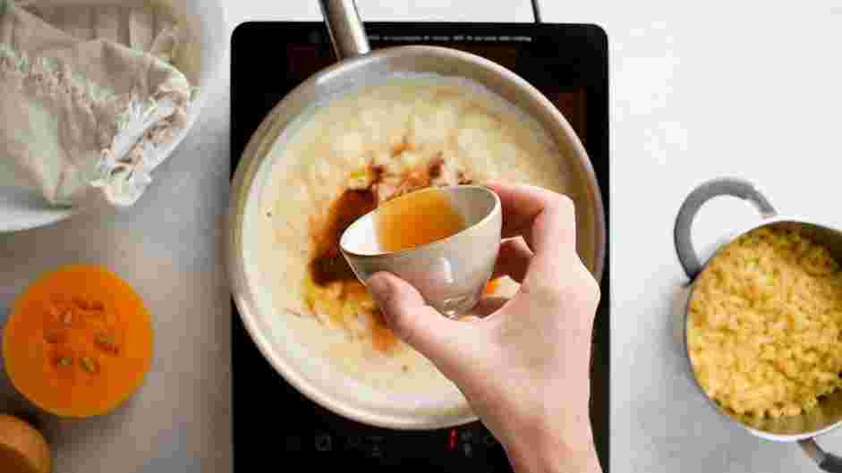 Pumpkin Mac and Cheese Recipe: Turn the heat to low and whisk in the pumpkin, truffle oil, nutmeg, brown sugar, brandy, truffle salt and all the cheeses.