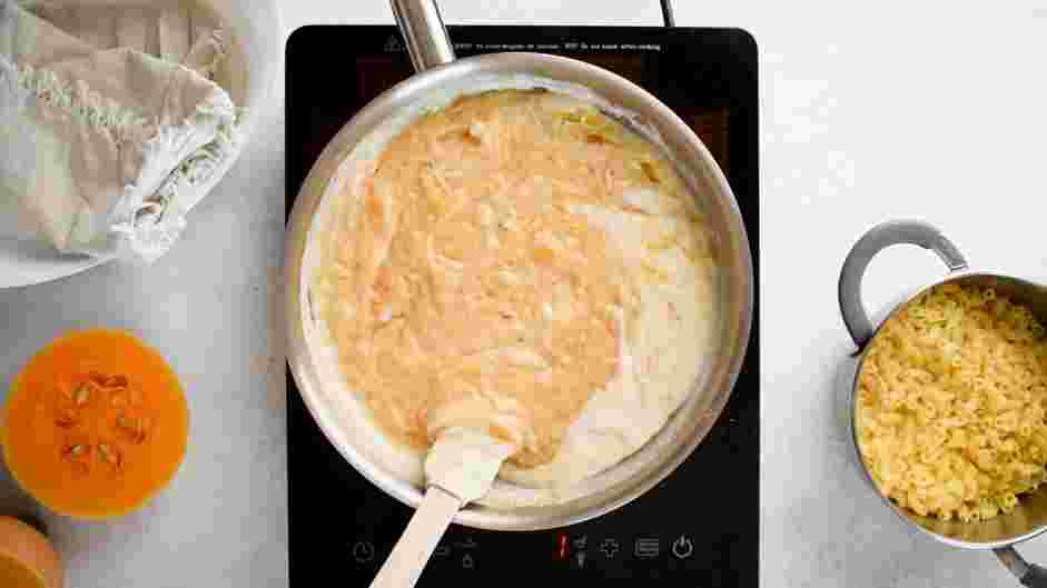 Pumpkin Mac and Cheese Recipe: Continue to stir until the cheeses melt and the sauce is smooth.