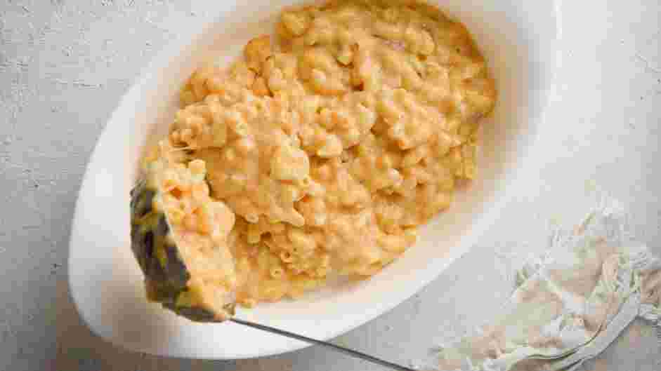 Pumpkin Mac and Cheese Recipe: Fold in the cooked pasta and pour the mixture into the prepared baking dish.