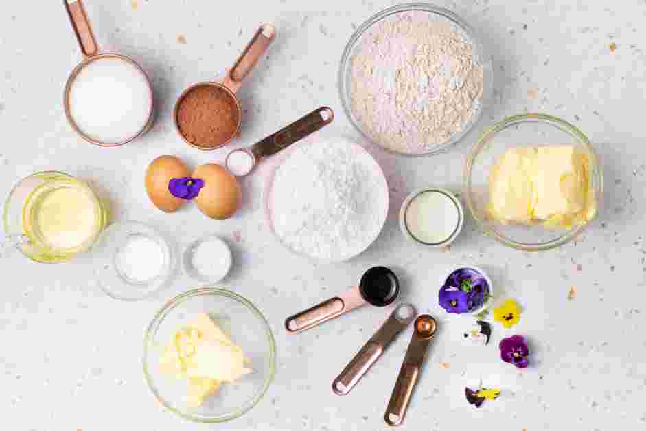 Gluten Free Chocolate Cake With Edible Flowers Recipe: Preheat oven to 350°F.