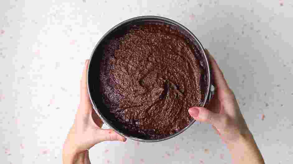 Gluten Free Chocolate Cake With Edible Flowers Recipe: Pour batter into the prepared cake pan.