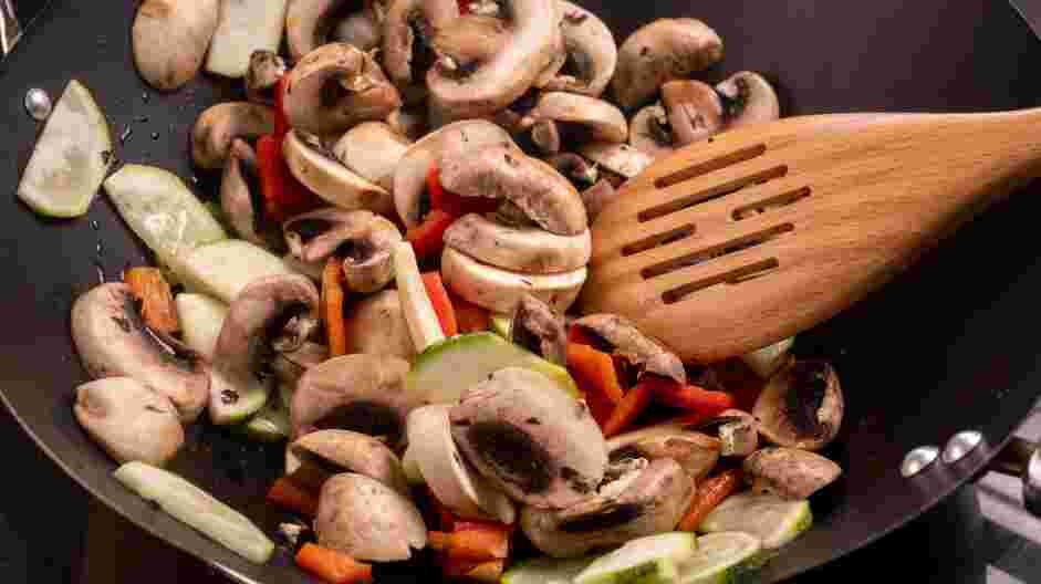 Vegetable Lo Mein Recipe: Heat the oil in a large non-stick pan over medium heat.