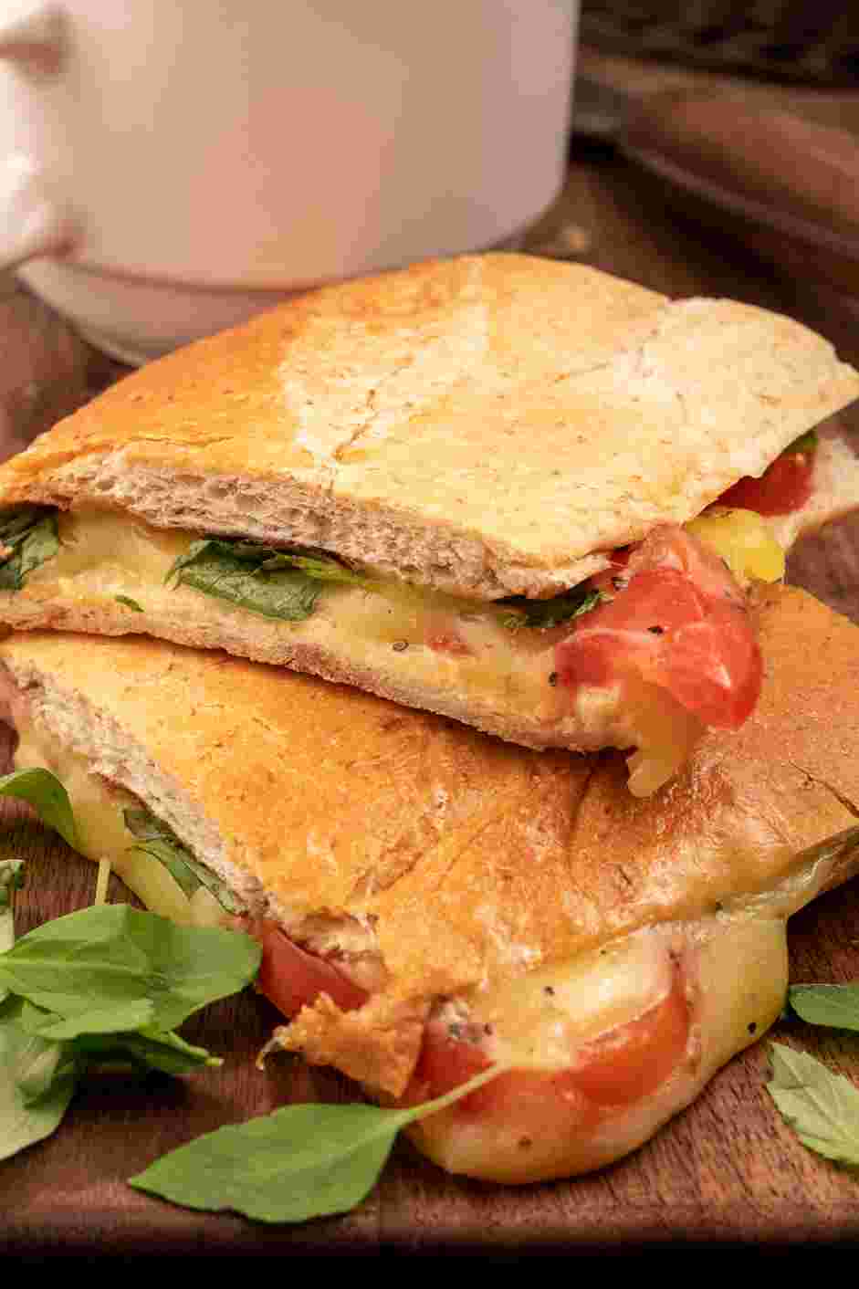 Caprese Panini Recipe: Press the sandwich until the bread is toasted and the cheese is melted, about 3-5 minutes.