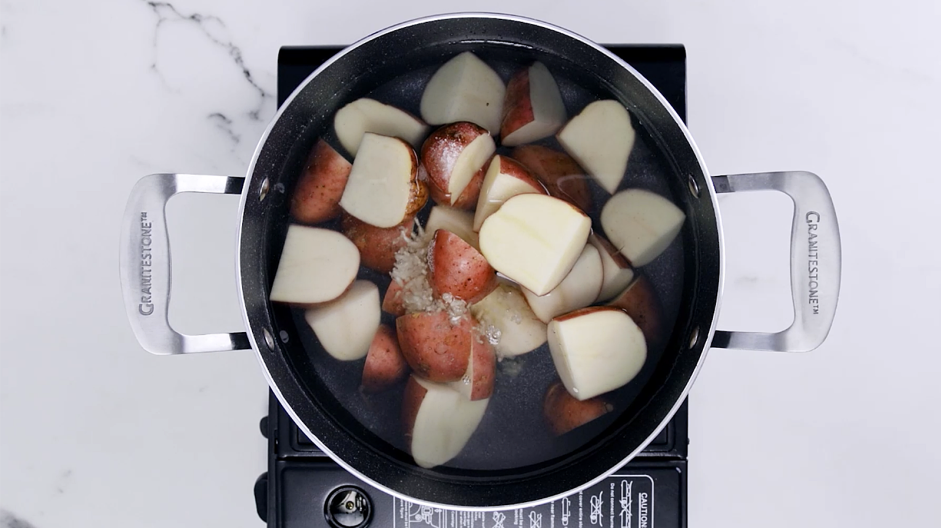 Red Skin Mashed Potatoes Recipe: In a large pot, add your red potatoes and cover with cold water until the potatoes are completely submerged.