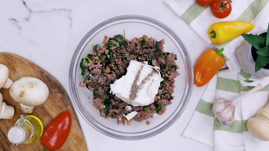 Keto Stuffed Mushrooms Recipe: In a large mixing bowl, mix the cream cheese and the sausage mixture.