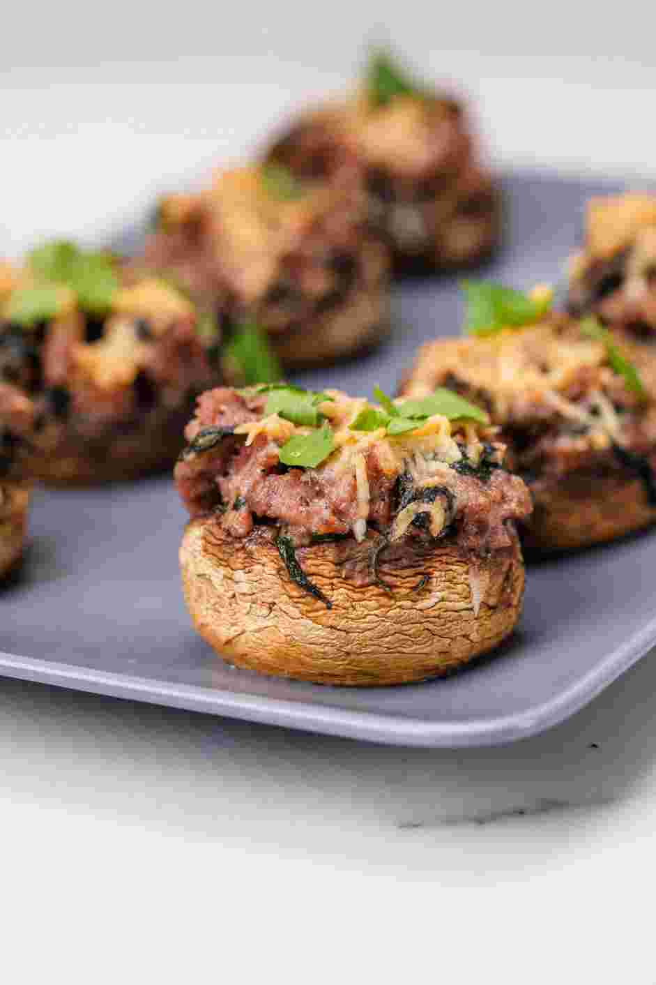 Keto Stuffed Mushrooms Recipe: Garnish your mushrooms with parsley and serve hot.