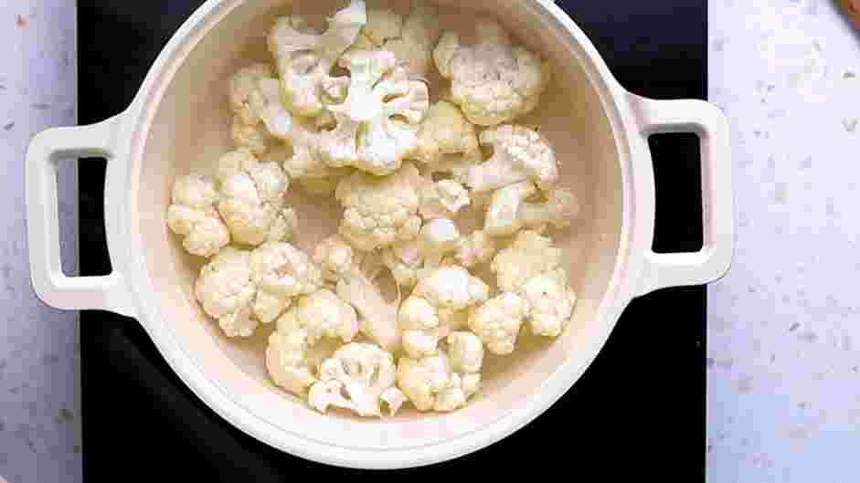 Cauliflower Gratin Recipe: Bring a pot of salted water to boil and cook the cauliflower for 5-7 minutes.