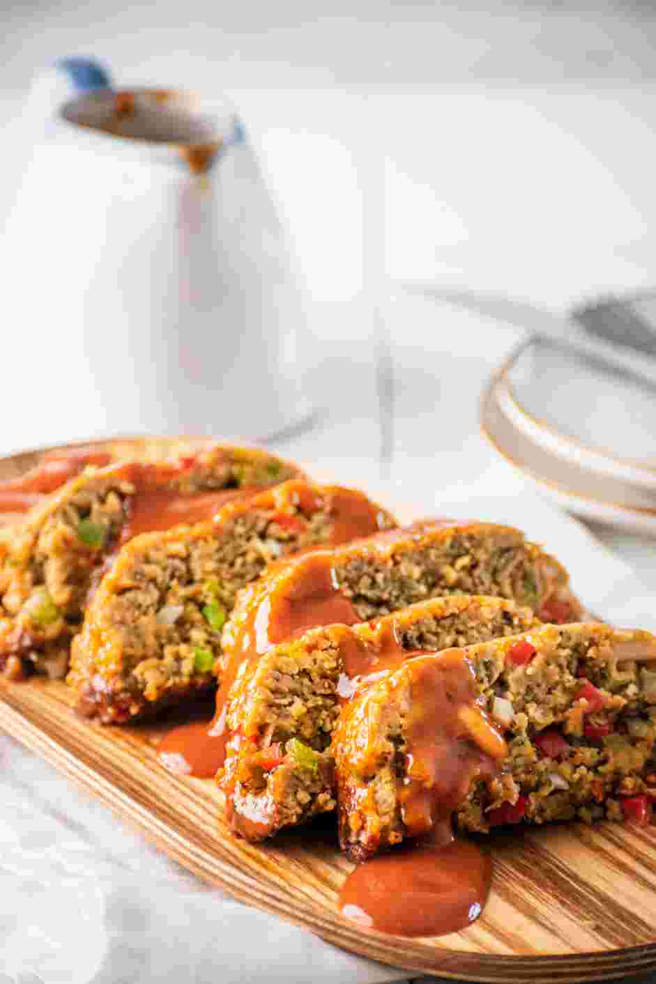 Vegan Meatloaf Recipe: Remove the meatloaf from the oven and let cool slightly before serving.