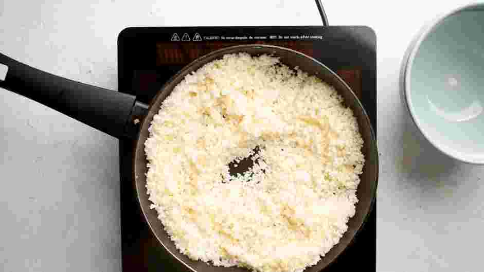 Cauliflower Chips Recipe: In a medium saucepan over low heat, cook the cauliflower for 3 minutes.