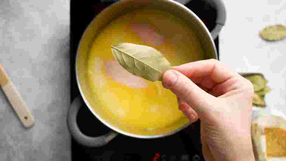 Greek Lemon Chicken Soup Recipe:
Stir in the chicken breasts, eight cups of chicken broth and bay leaf to the pot.