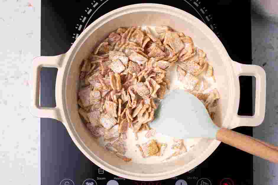 Cinnamon Toast Crunch Ice Cream Recipe: Turn off the heat and add in two cups of cinnamon toast crunch cereal.