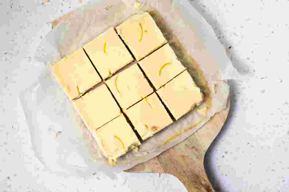 Lemon Cheesecake Bars Recipe: When completely chilled, remove cheesecake from the pan and cut it into squares.