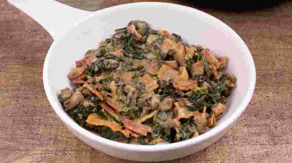 Keto Creamed Spinach Recipe: Transfer mixture into a baking dish and bake in the oven for 15 minutes at 350°F.