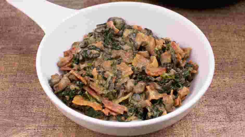 Keto Creamed Spinach Recipe: Transfer mixture into a baking dish and bake in the oven for 15 minutes at 350&deg;F.