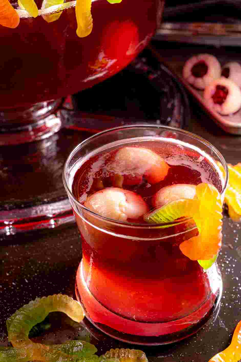 Halloween Punch Recipe: Serve the punch ladled into a cup with a couple of lychee eyeballs.