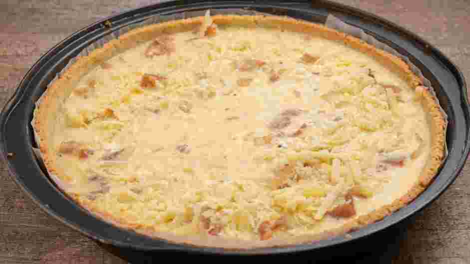 Keto Quiche Recipe: Gently pour the cream mixture over the bacon, onion and the Gruyere.