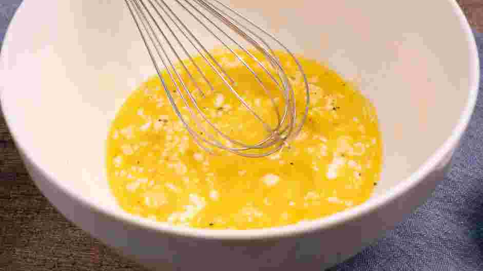 Fluffy Scrambled Eggs Recipe: In a small bowl, whisk together the eggs, the diced butter, mayonnaise, salt and pepper until the mixture is lighter in color.