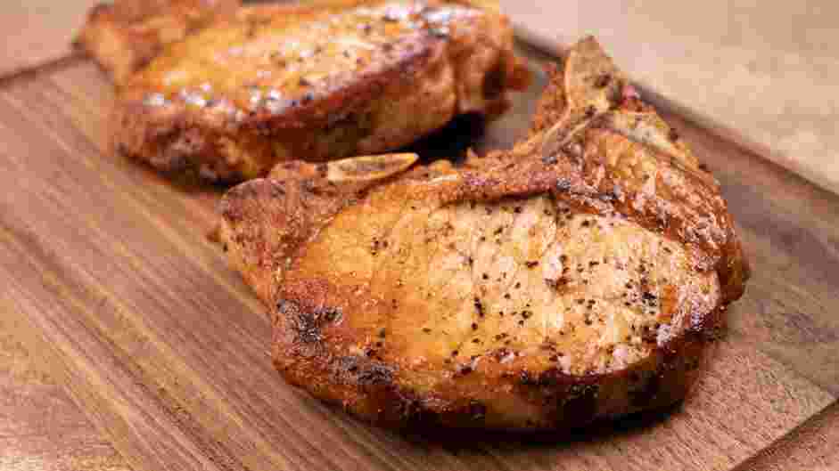 Skillet Pork Chops Recipe: Let the pork chops rest for 3-5 minutes on a cutting board.