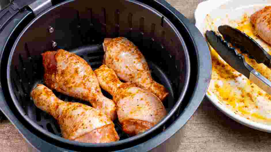 Air Fryer Drumsticks Recipe: Place drumsticks in the air fryer basket in a single layer.