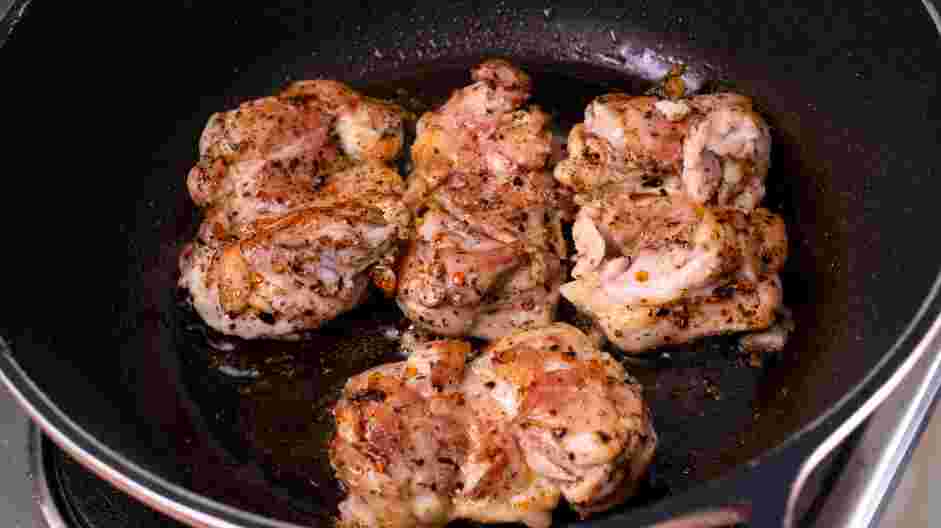 Greek Chicken Recipe: When the oil is hot, add the chicken to the pan.