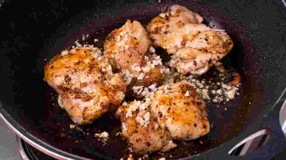 Greek Chicken Recipe: Add the minced garlic and remove the pan from the heat so the garlic doesn't burn.