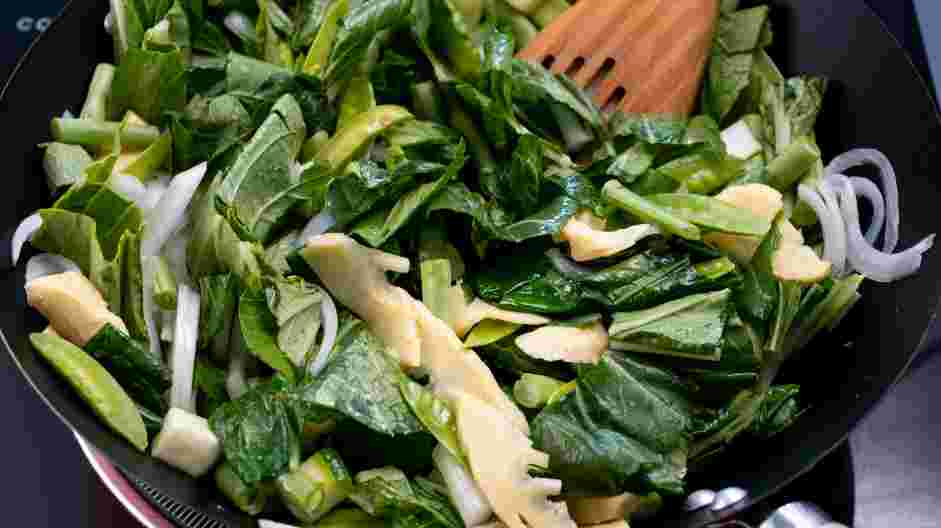 Thai Red Curry (Vegetarian) Recipe: Add the bok choy, onions, zucchini, snow peas, bamboo shoots and green beans.