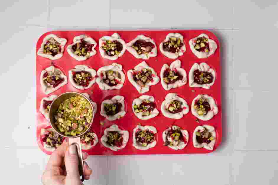 Cranberry Brie Bites Recipe: 
Top with chopped pistachios.