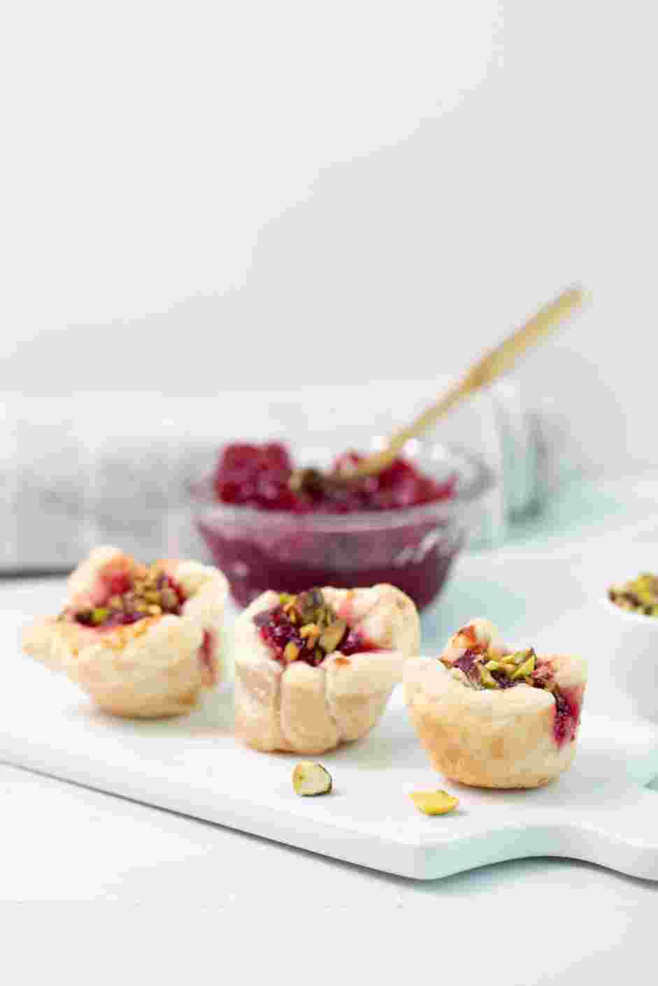 Cranberry Brie Bites Recipe: 
Remove from the oven and let cool for 5-10 minutes before transferring the bites onto a serving plate.