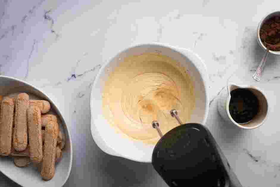 Italian Tiramisu Recipe: With a handheld mixer, whip the egg yolks and sugar together until lighter in color and thickened.