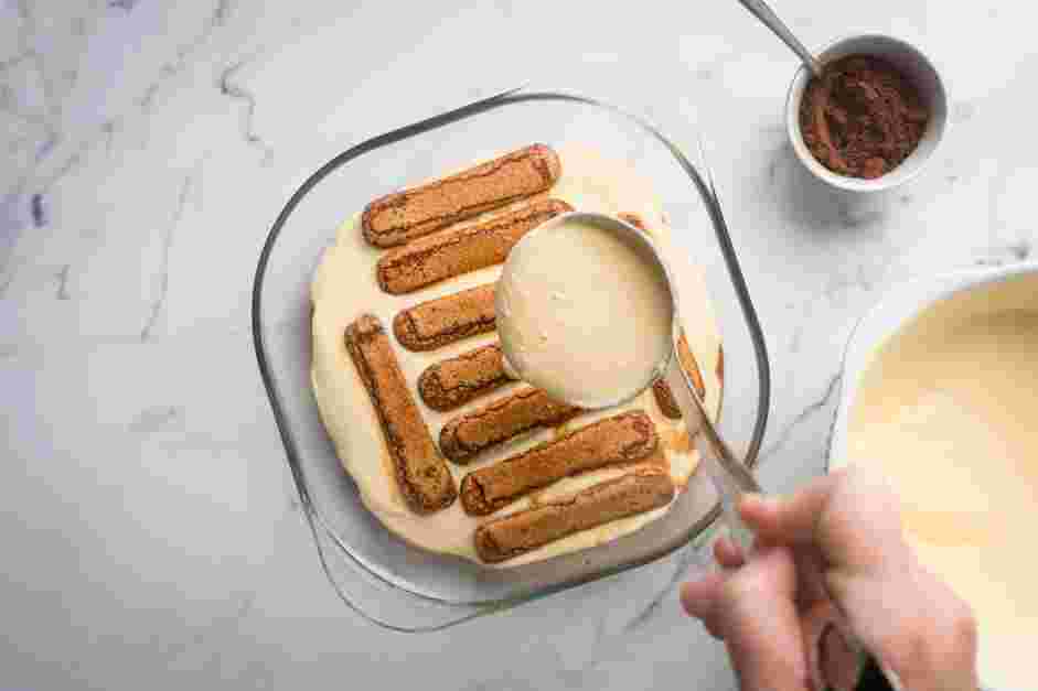 Italian Tiramisu Recipe: Top the espresso-soaked ladyfingers with the mascarpone mixture.