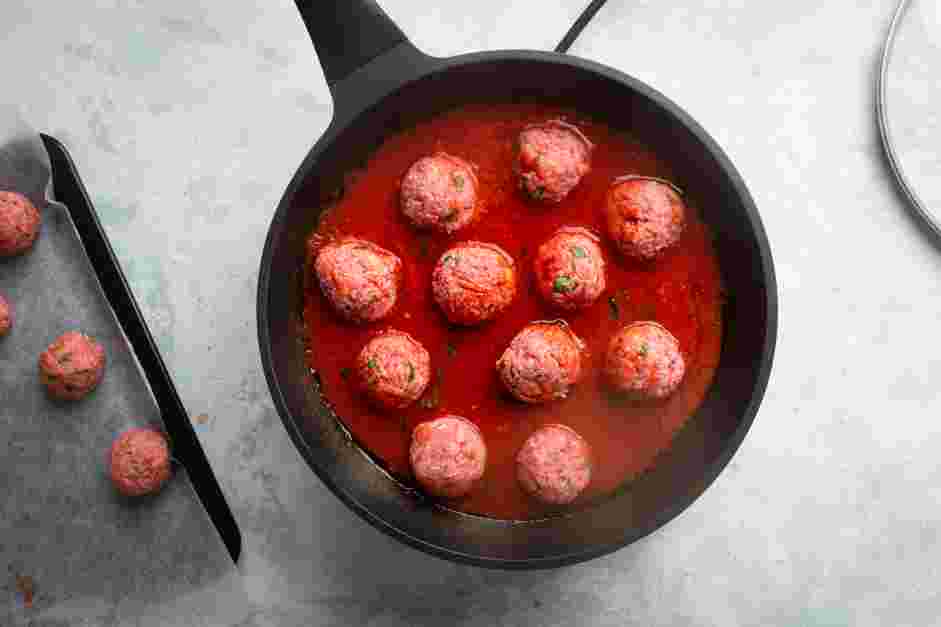 Meatball Marinara Recipe: Place the meatballs into the sauce, cover the pan and decrease the heat to low.