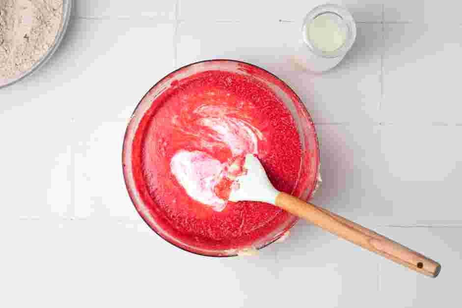 Red Velvet Cupcake Recipe: Add one-third of the flour mixture to the batter, then half of the buttermilk.