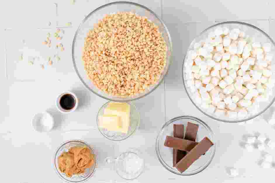 Peanut Butter Rice Krispie Treats Recipe: Grease and line a 9x9-inch baking pan with parchment paper.