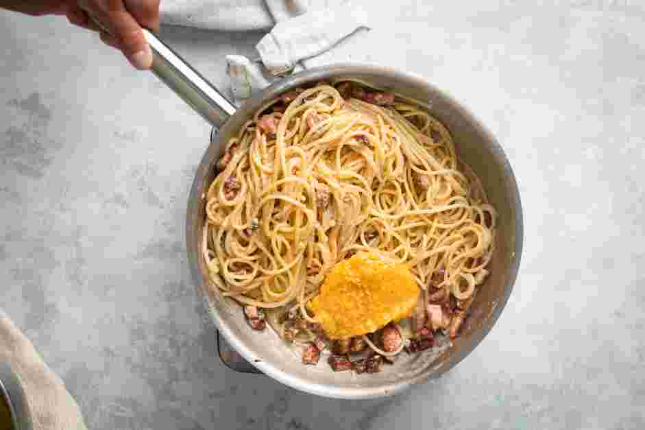 Traditional Carbonara Recipe: Remove the pasta from the heat and add the egg mixture.