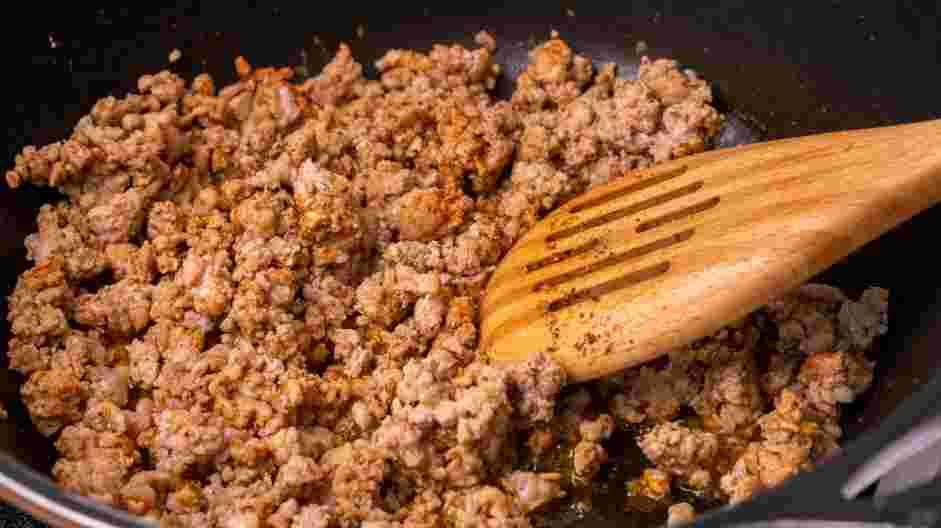 Sausage Dip Recipe: In a large skillet over medium heat, cook the ground sausage until evenly browned.