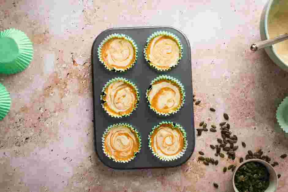 Pumpkin Cream Cheese Muffins Recipe:
Drop 1 teaspoon of the cream cheese mixture on top and gently swirl with a toothpick.