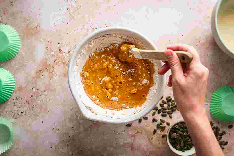 Pumpkin Cream Cheese Muffins Recipe: Fold in the flour mixture into the pumpkin mixture until just combined.