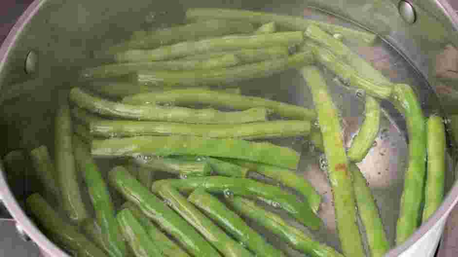 Green Bean Almondine Recipe: 
Prepare a large bowl with ice water.