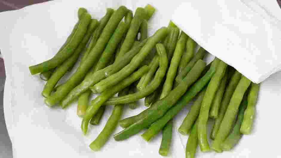 Green Bean Almondine Recipe: 
Remove the green beans from the ice water and gently pat dry.